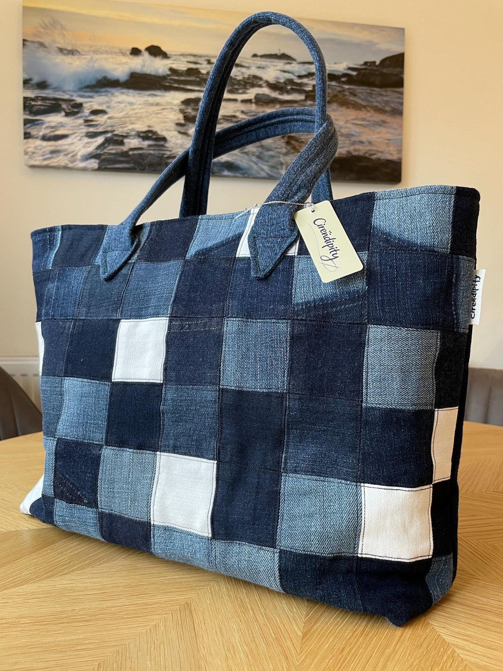 Handmade recycled zip top patchwork denim tote bag with aquarium fabric lining