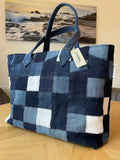 Handmade recycled zip top patchwork denim tote bag with aquarium fabric lining