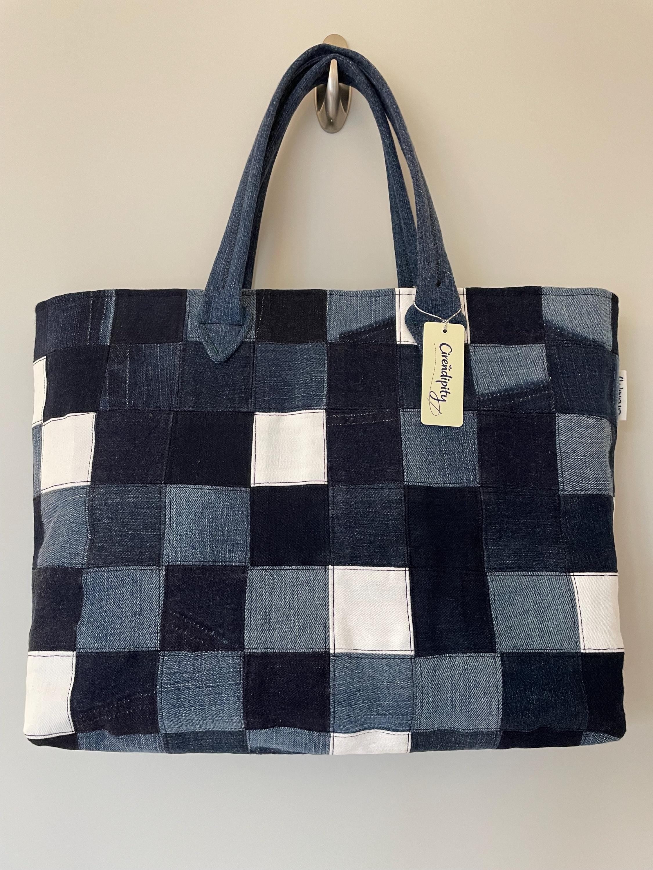 Handmade recycled zip top patchwork denim tote bag with aquarium fabric lining