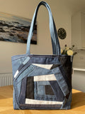 Handmade recycled patchwork denim tote bag with Sophie Allport bees fabric lining