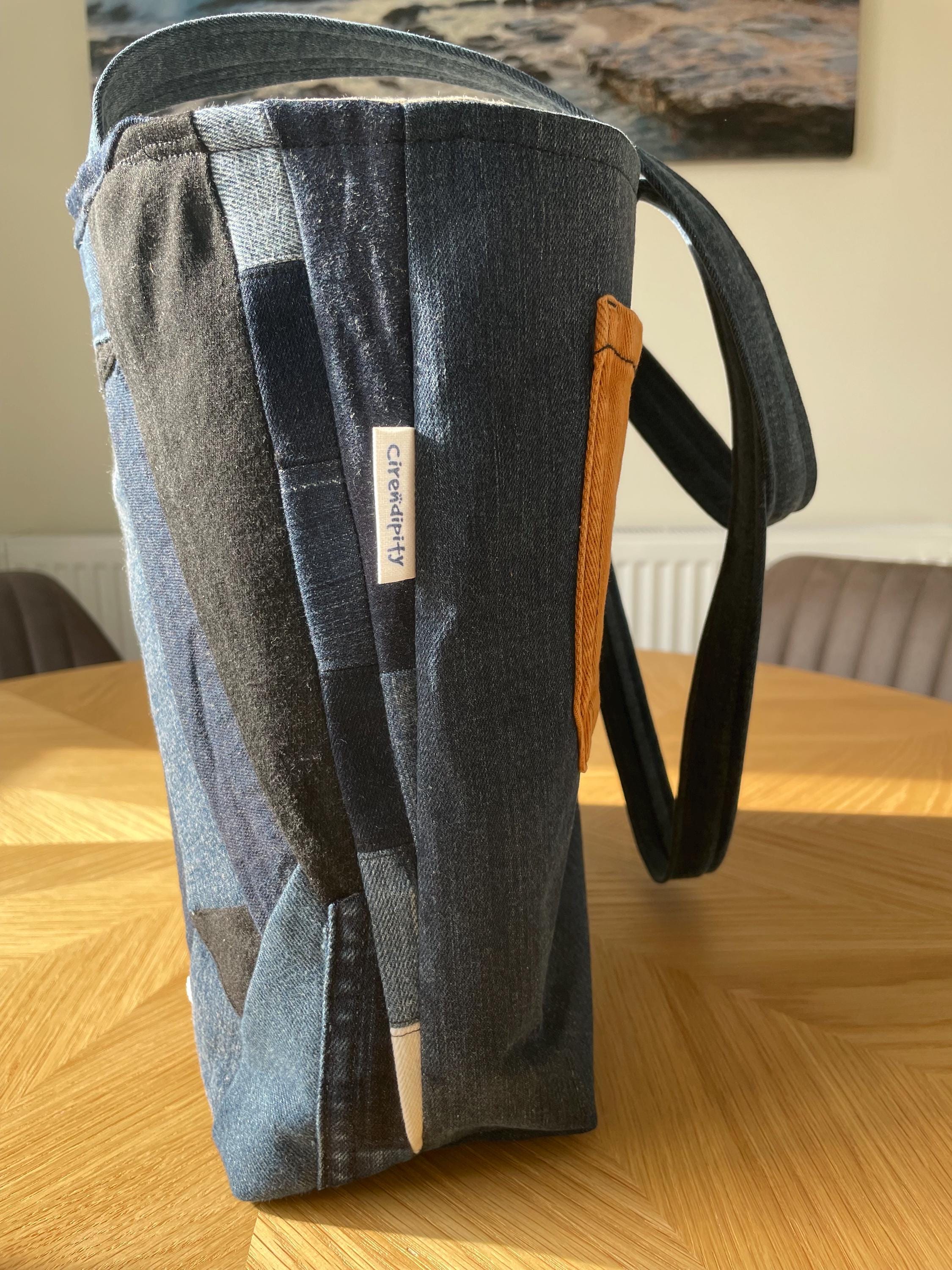 Handmade recycled patchwork denim tote bag with Sophie Allport bees fabric lining