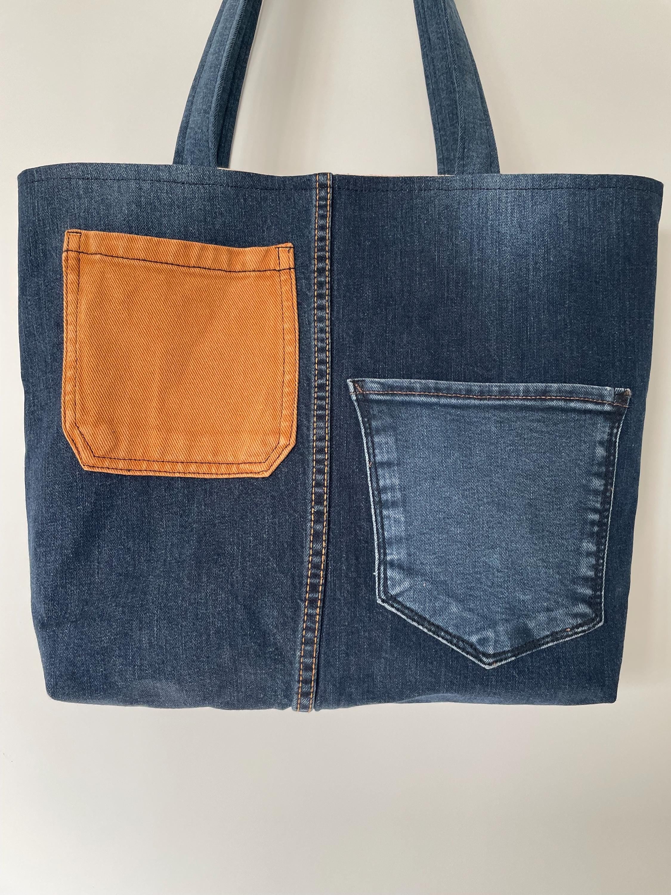 Handmade recycled patchwork denim tote bag with Sophie Allport bees fabric lining